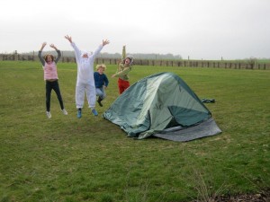 Polar children celebrate putting up tent